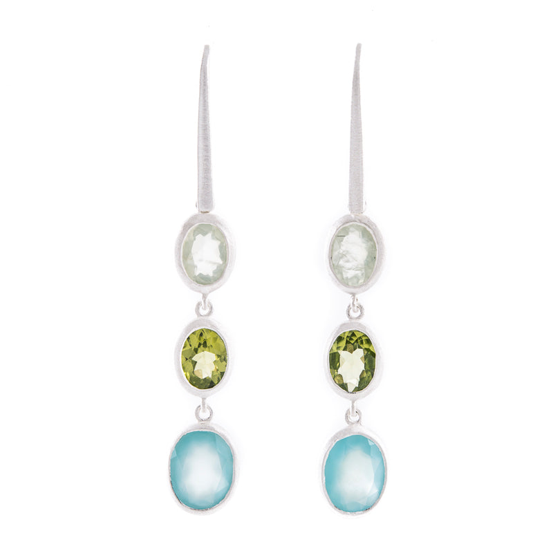 drei-facettierte-Edelsteine-eine harmonischen-Komposition-Aqua-chalcedon-peridot-Prehnit